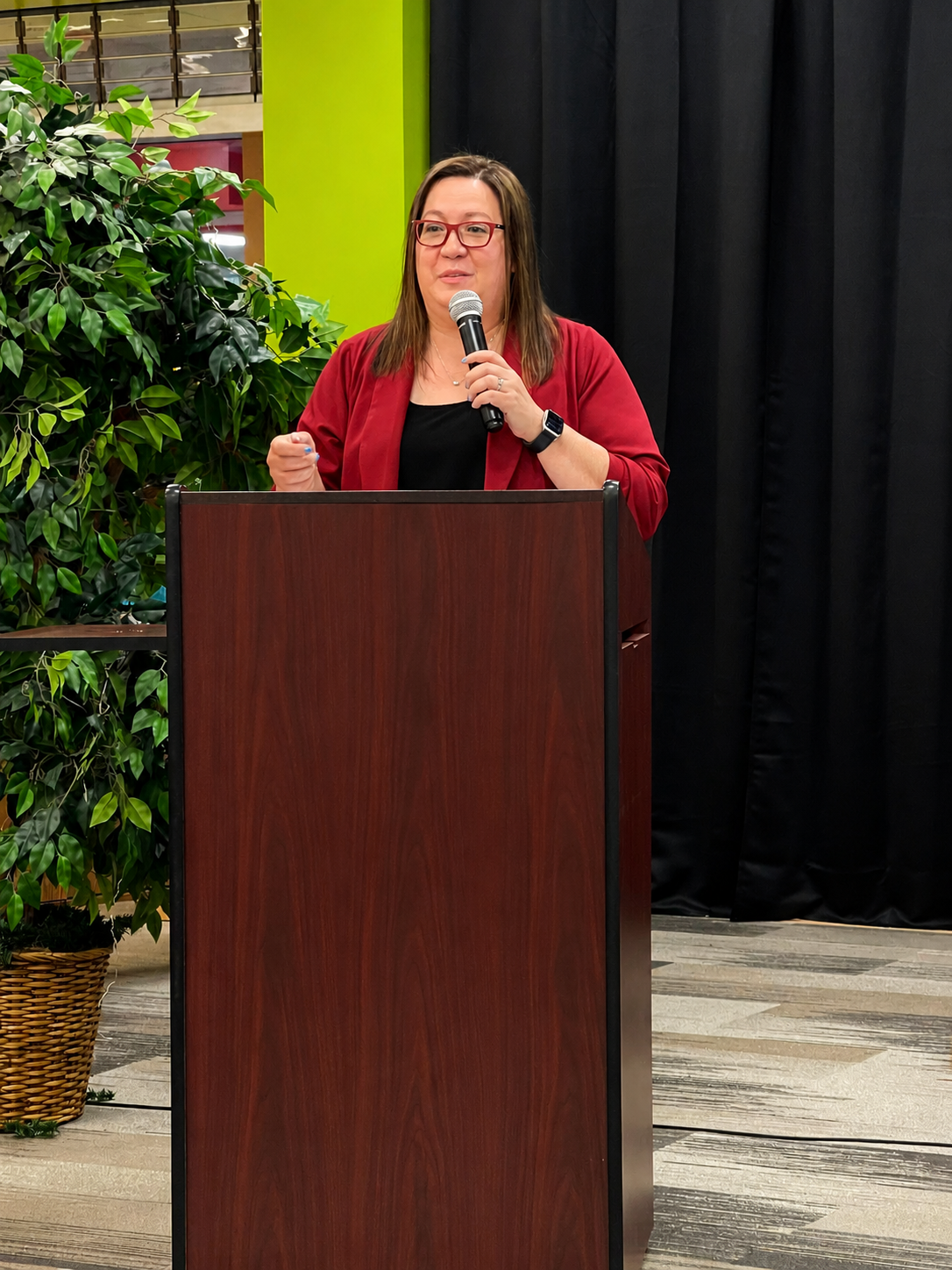 Amy K. Nunn speaking at a leadership event
